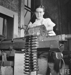 Testing a 20mm aircraft caynon at Aberdeen Proving Ground, 1942. Photo by Myron Davis.