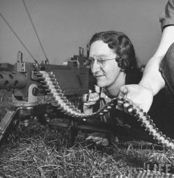 Testing a 30 cal. machine gun at Aberdeen Proving Ground, 1942. Photo by Myron Davis.