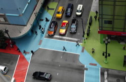 britticisms:  Installation shots of Jessica Stockholder’s Color Jam, which paints the streets and buildings on State and Adams in Chicago with swaths of rich colored vinyl. I’ve walked through this space numerous times during the past couple of days.