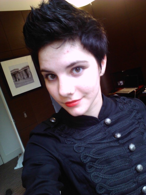 fuckyeahhardfemme: Queer gal femme pompadour, red lips, and my new favorite jacket? Yes yes. (submit
