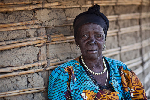 Lendu &ldquo;Mama&rdquo; in front of her mud hut - DR CONGO - by C.Stramba-Badiali on Flickr.