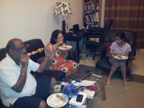 Here&rsquo;s the family chowing down on some barbecued chicken on skewers. Got the recipe from C