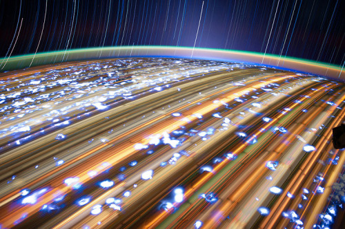 wired:  chels:  curiositycounts:  Absolutely striking photography of star trails taken from the International Space Station as it orbits Earth at 17,000 mph. See full set here. (via)  WOAH. Don Pettit’s taking some unreal shots from space.   Concure.
