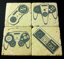 thenintendard:  Nintendo Controller Coasters Set of 4 Nintendo Controller themed coasters. Made of travertine marble, with felt feet on the bottom so they wont scratch your table. By GeeVeeWorks  