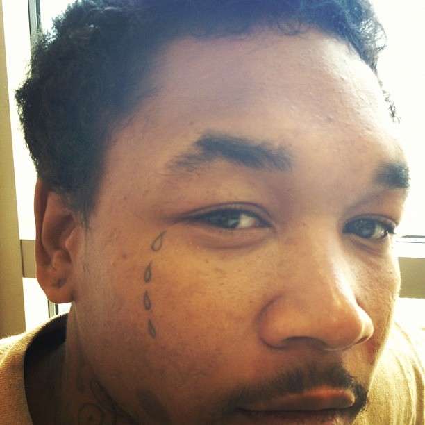 My new friend “D” thinks my hobby of photographing face tattoos is hi-lar-i-ous! (Taken with Instagram at Harris County Criminal Justice Center)