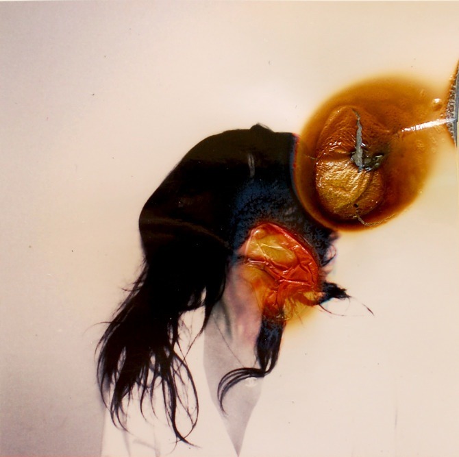  “Ausência”, burned photographs by Lucas Simões 