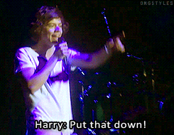omgstyles:  Girls holding up the letters “PUSSY” and Harry telling them to take