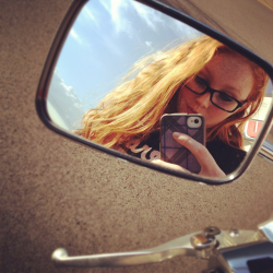 gingertopia:  On a motorcycle ride with my Dad. Wicked wild hair from the wind! 