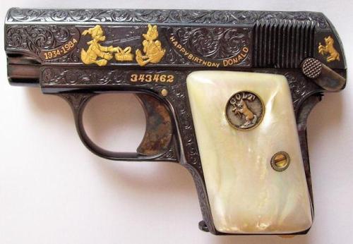 Mickey Mouse Commemorative- 1908 colt .25 pocket pistol.Created in 1981 by master engraver Alvin A. 