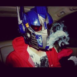 Jae Bee smoking in an optimus prime maskk