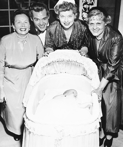 Lucille Ball and Desi Arnaz with their newborn daughter Lucie Arnaz. and their mothers DeDe, and Dol