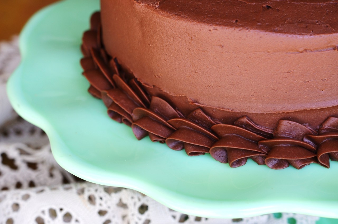 Chocolate buttercream frosting. This is super yummy, and makes lots. For the cake recipe, go here.
Ingredients:
• 1 ½ cups butter (3 sticks), room temperature
• 6 cups sifted powdered sugar (about 1 ½ pounds)
• 1 cup cocoa powder
• ¾ teaspoon vanilla...
