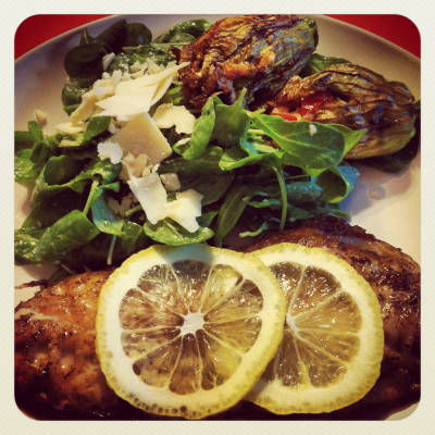 Local red snapper, sautéed squash blossoms stuffed with zucchini, cherry tomatoes, and feta, best baby arugula ever.