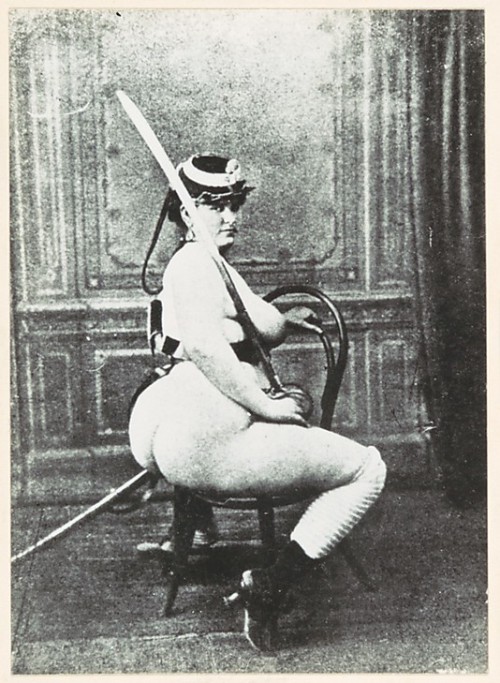 bibulousbibliophile:  void-dance:  Because, you know - nude women seated in chairs holding swords! r