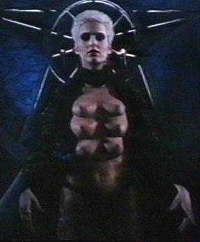 Leeanne Baker in Necropolis, 1987. You can order the six-breasted foam latex appliance she wore at the Prop Store.