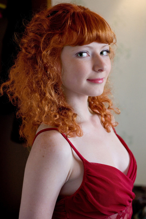 curly redhead looking at you