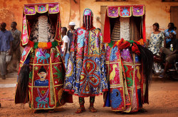 guardian:  Nigerian Yaruba dressed as voodoo spirits perform during a voodoo ceremony in Ouidah, Benin. Each spirit represents the reincarnation of a dead member of the Nigerian Nagu clan Photograph: Dan Kitwood/Getty Images 