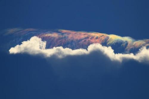 battlepope-deactivated20130807:  The fire rainbow is the rarest of all naturally occurring phenomena. The clouds must be cirrus and at an altitude of 20,000 feet at least. There must be just the right amount of ice crystals present, as well.  The sun