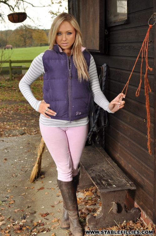 Porn photo Long-haired blonde in purple parka vest and