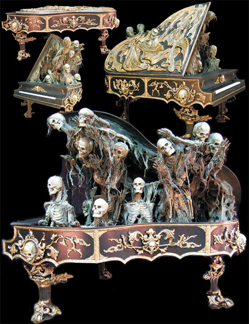 ledemurecorpse: Beautifully detailed gothic piano features Grim Reaper relief sculpture on lid with 