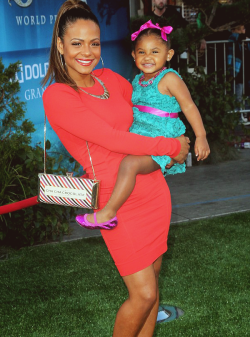 fuckyeahfamousblackgirls:  Christina Milian with daughter Violet at the movie premiere of “Brave” 