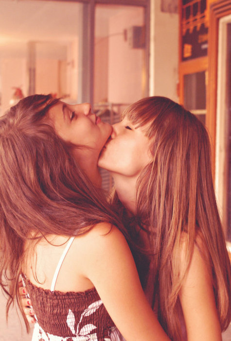 Lipstick lesbians kissing