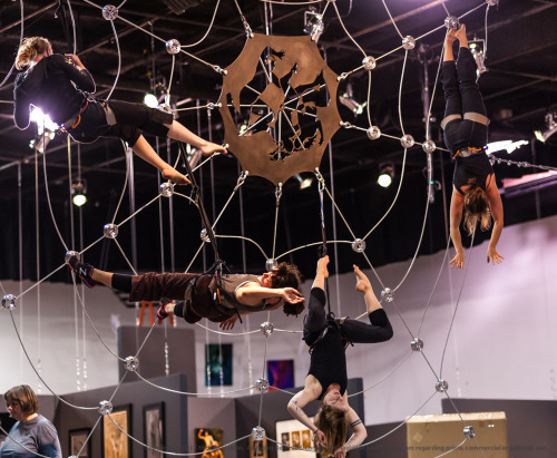 Aerialists practicing on their custom-built spiderweb prior to the opening of the 2012 Seattle Eroti