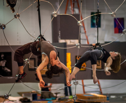 Aerialists practicing on their custom-built spiderweb prior to the opening of the 2012 Seattle Eroti