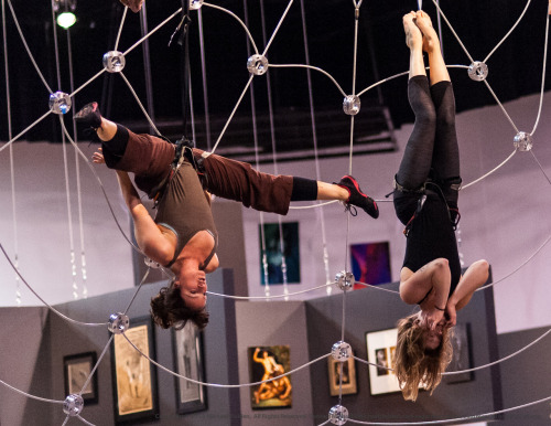 Aerialists practicing on their custom-built spiderweb prior to the opening of the 2012 Seattle Eroti