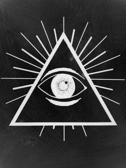 misssecretagent:  The Eye of Providence, more commonly known as the All-Seeing Eye, is symbolized by the eye within the pyramid and is usually surrounded by rays of light. The origin of the All-Seeing Eye can be traced back to the Eye of Horus (Eye of