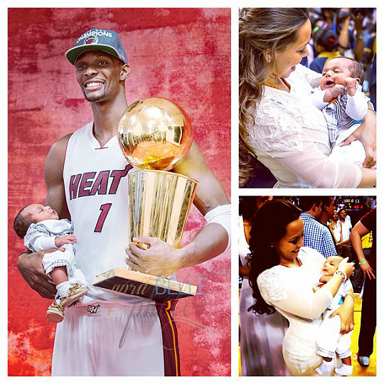 fuckyeahhmiamiheatt:  Bosh holding his two prized possessions. 