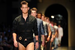 wetheurban:  VERSACE SPRING/SUMMER 2013  Versace’s menswear Spring 2013 collection is all about the modern gladiator. Donatella Versace takes men’s fashion to a fun place incorporating bright wild colors, emblem encrusted gladiator sandals, holdalls,