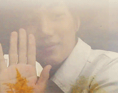 Kai put his hand on the window for the fan “touch” his hand