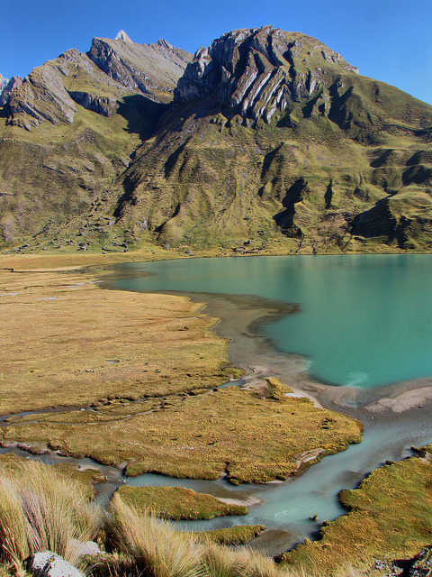 The edge of Laguna Carhuacocha on the Huayhuash Trek, Peru (by mikemellinger).