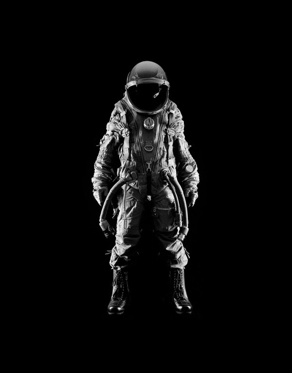 dawnawakened:  Emerging from a void, Andrew G. Hobbs‘ hallowed portrait of an astronaut