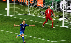 siphotos:  Alessandro Diamanti celebrates after scoring the decisive kick Sunday to send Italy through to the European Championship semifinals with a 4-2 win in the shootout following a 0-0 tie with England. The Italian team will take on Germany in the