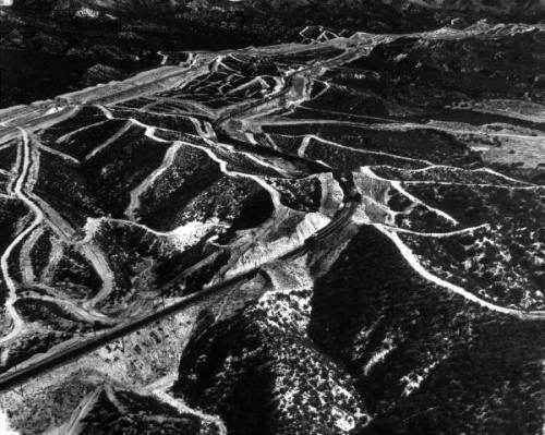 Freight train traveling through the El Cajon Pass outside San Diego, CA, photographed from a helicop