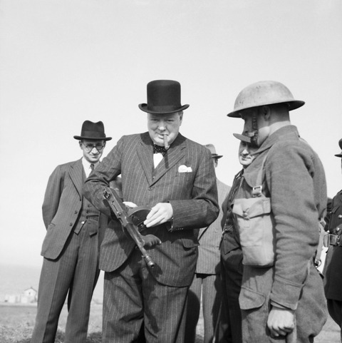 Winston Churchill Inspects Tommy Gun 1940.German propaganda used this photo to portray Churchill as 