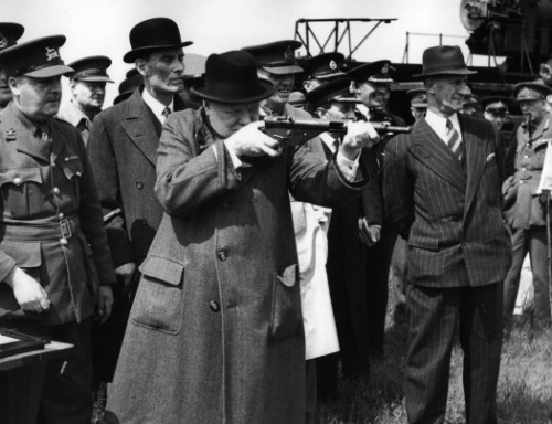 Winston Churchill firing Sten submachine gun, WWII