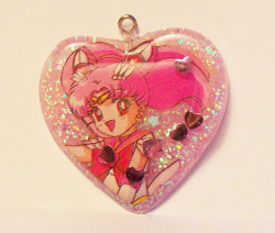 bijiip:  handmade resin Chibi moon pendant filled with sparkles and hearts! will be available on my etsy shop soon. http://www.etsy.com/shop/kitschchimera