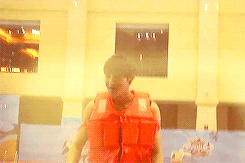 Tao being thrown into the water
