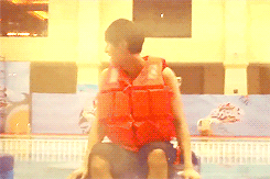 Tao being thrown into the water