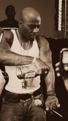 old-school-shit:  o-u-t-l-a-w-z:  Treach pouring a tribute shot of Hennessy to his tattoo of 2pac.   Respect. 