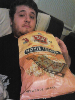 Okay okay this bag of popcorn is as big as my torso. It is kind of overwhelming.