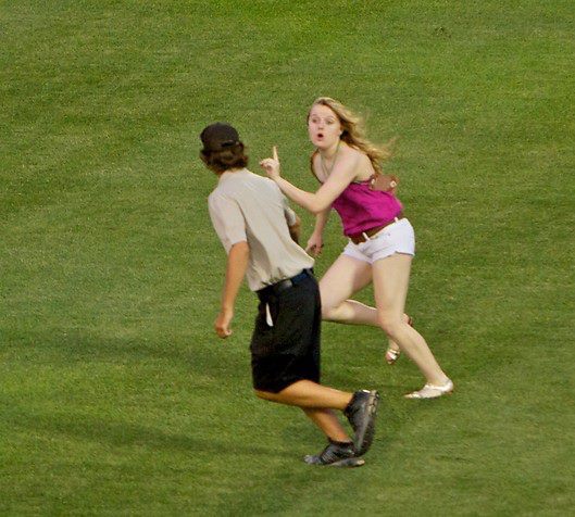  Candice Sortino, age 17, ran out on the field during the 7th inning of the Arizona