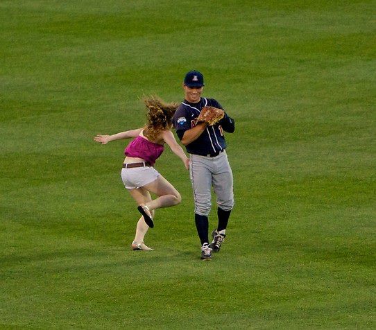  Candice Sortino, age 17, ran out on the field during the 7th inning of the Arizona