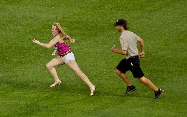  Candice Sortino, age 17, ran out on the field during the 7th inning of the Arizona