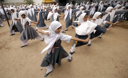 liberated-soul:  Muslim schoolgirls from St. Maaz high school practise Chinese wushu martial arts inside the school compound in the Indian city of Hyderabad. Girls from ages 10 to 16 participate in weekly sessions during school term. Source: 1, 2. 