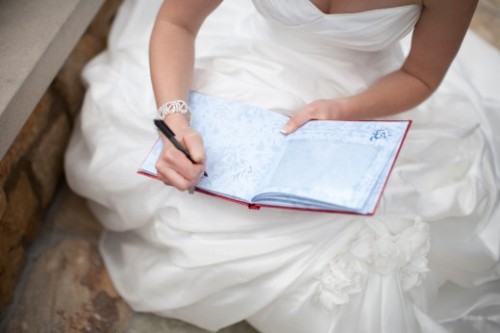 :  “On Disneyland bride Kristie’s wedding day, a tiny tot approached her with his autograph book in tow- he thought she was a Disney princess (rightfully so, she looked stunning!) and was determined to get her autograph. Kristie of course obliged