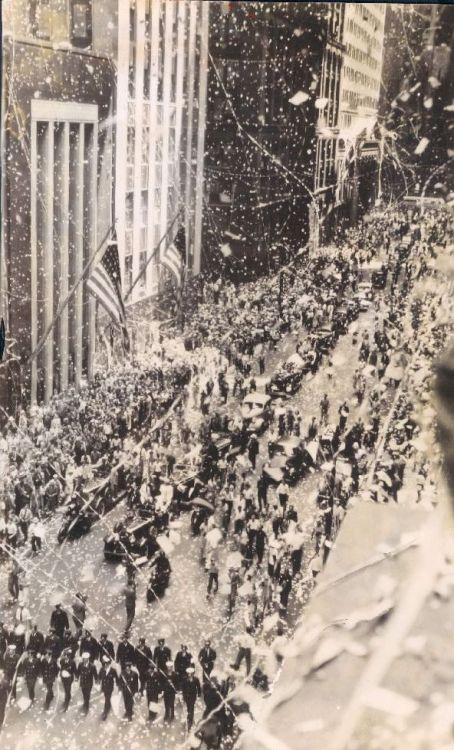 Ticker tape parade honoring Howard Hughes who had just flown around the world, 1938, Chicago.